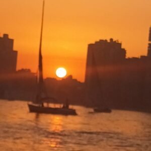 watching sun set on a boat in Luxor
